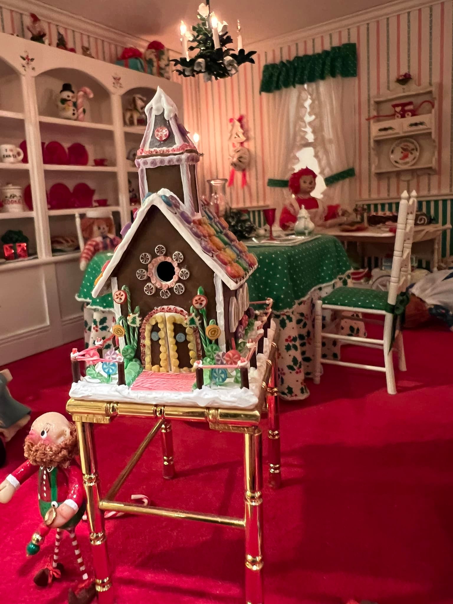 Raggedy Ann and Andy's Christmas house in a miniatures setting