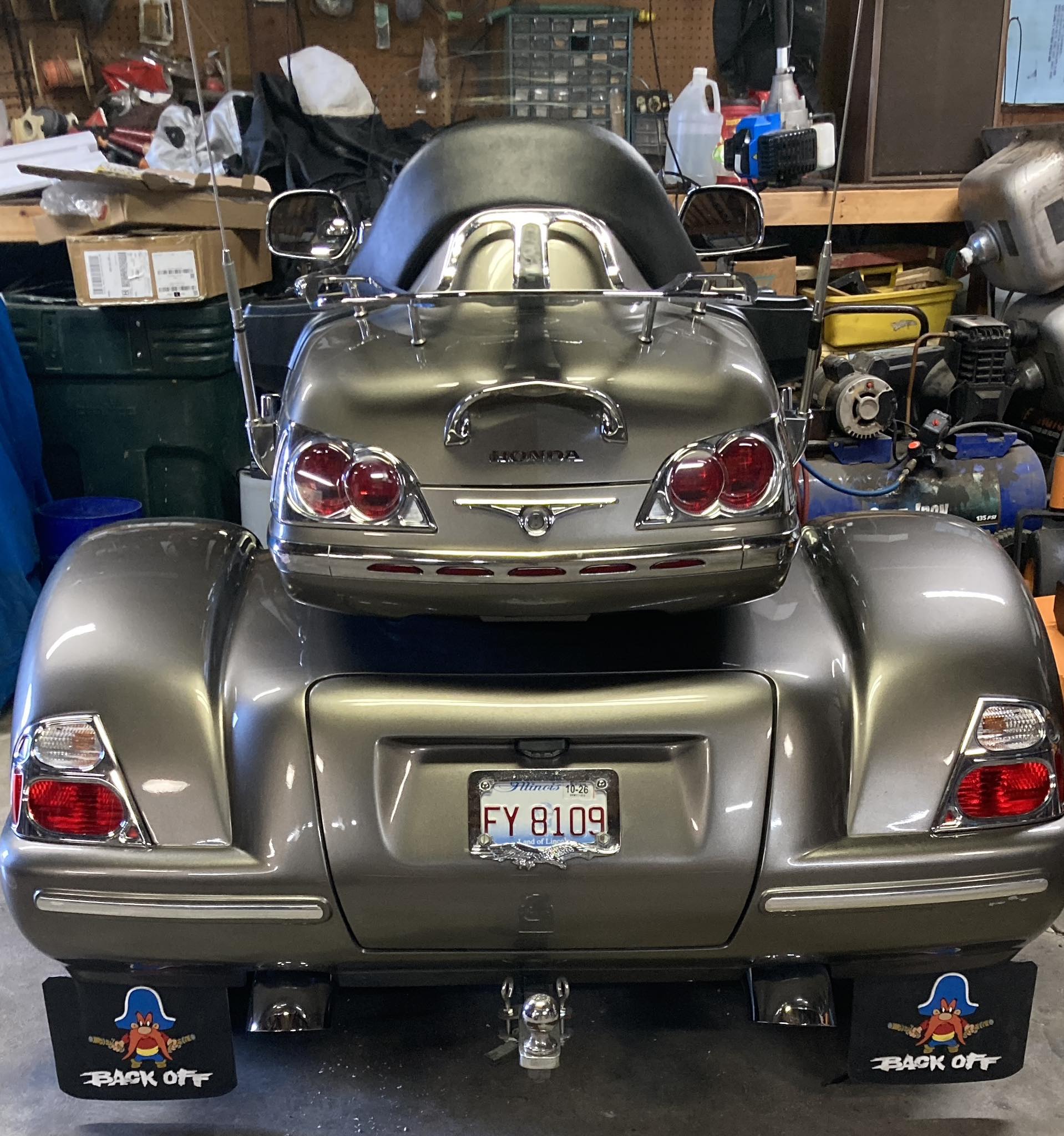 Added mud flaps to Honda Goldwing trike for protection