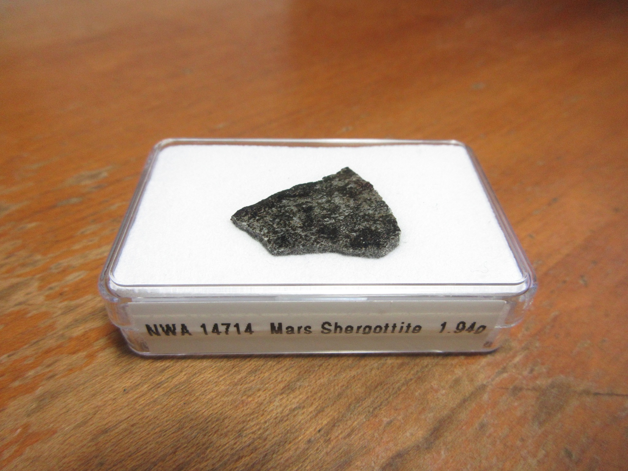 Current Bid of $33 for this 1.94g slice of NWA 14714 Martian 