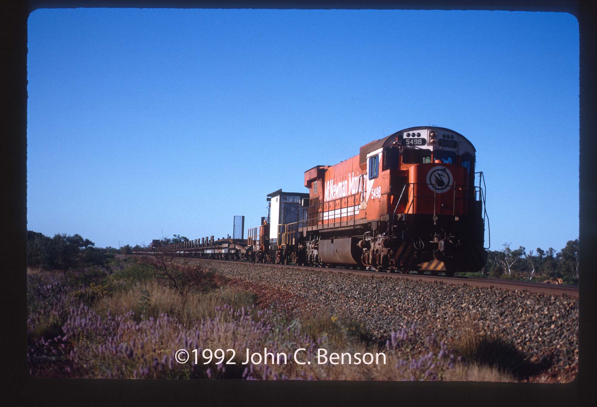 Mount Newman M636 5498 with a work train near Newman