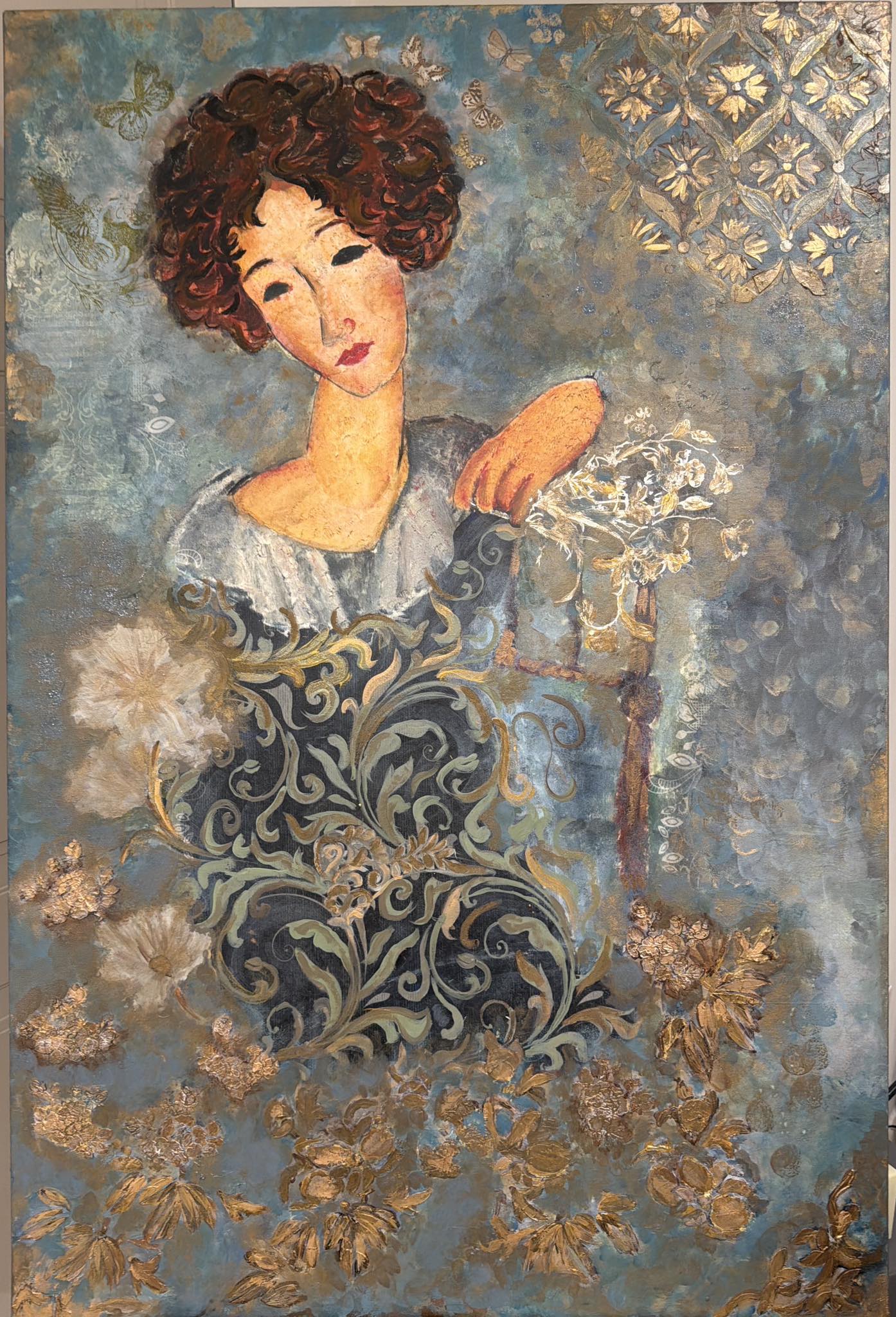 Mixed media art with layered textures and collage elements