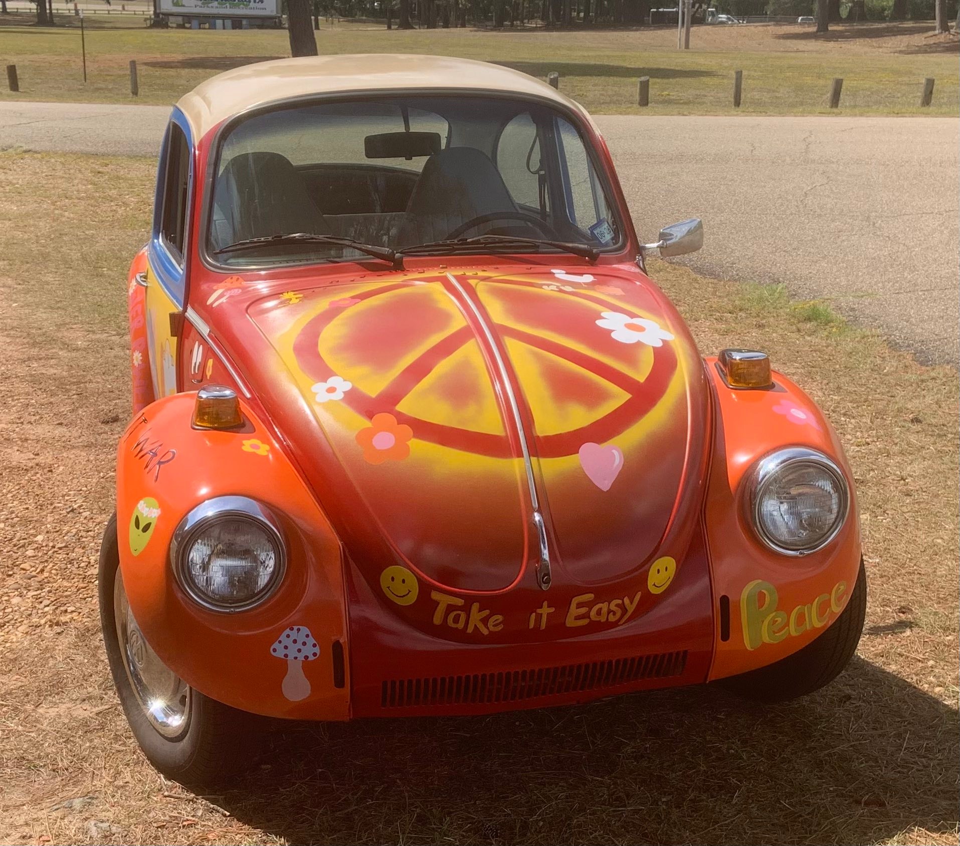 1967 VW Beetle convertible painted in hippy style. 2/2
