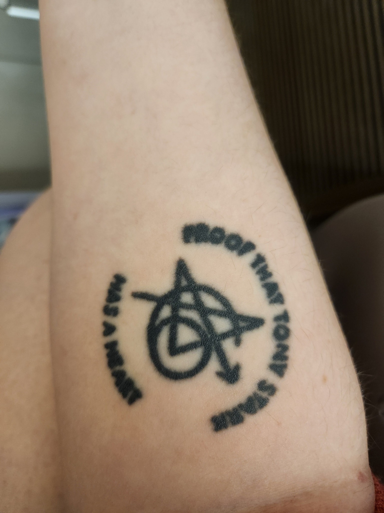 Fixing tattoo text that healed too close together