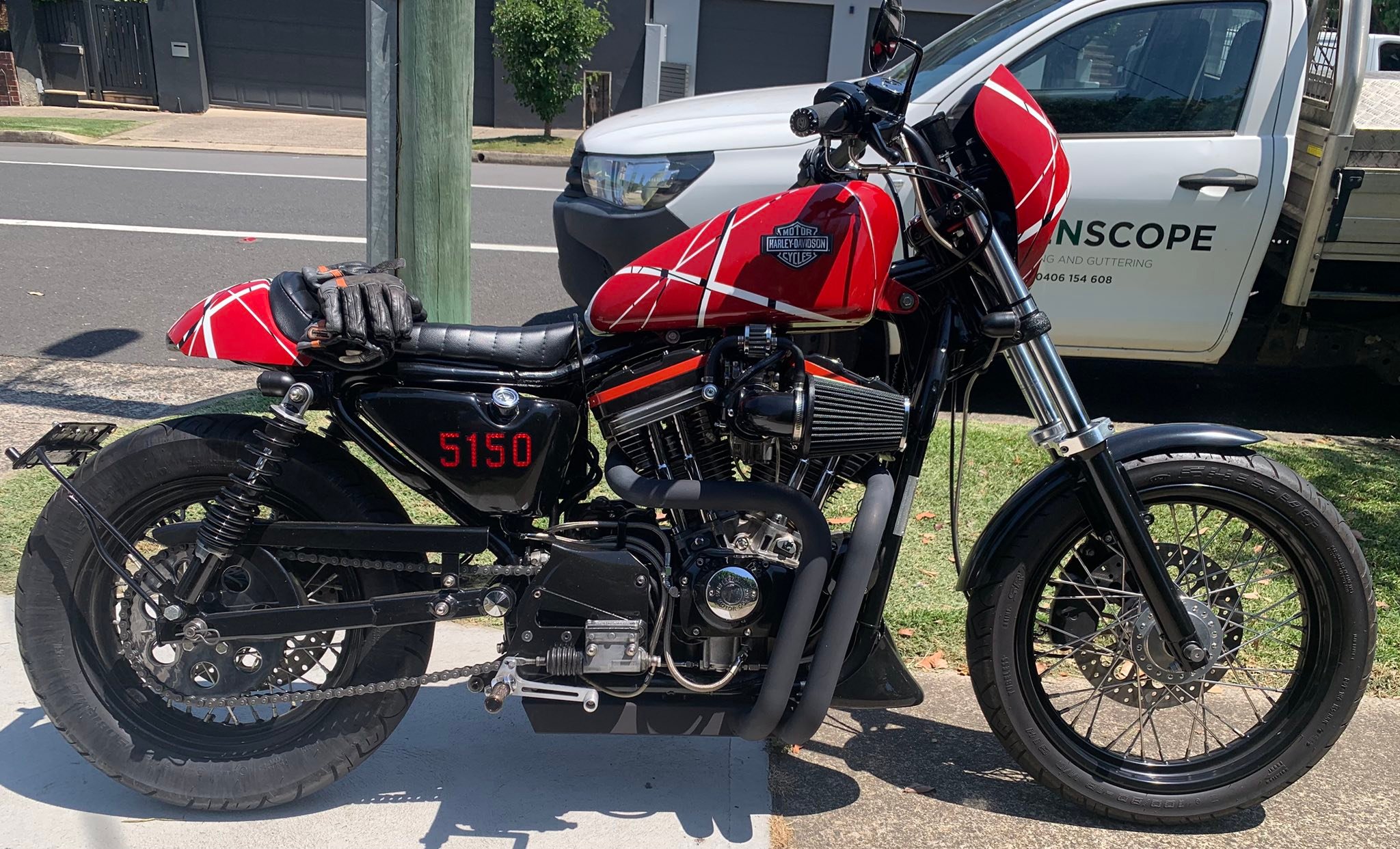 Customized Harley-Davidson motorcycle with CB750 tail