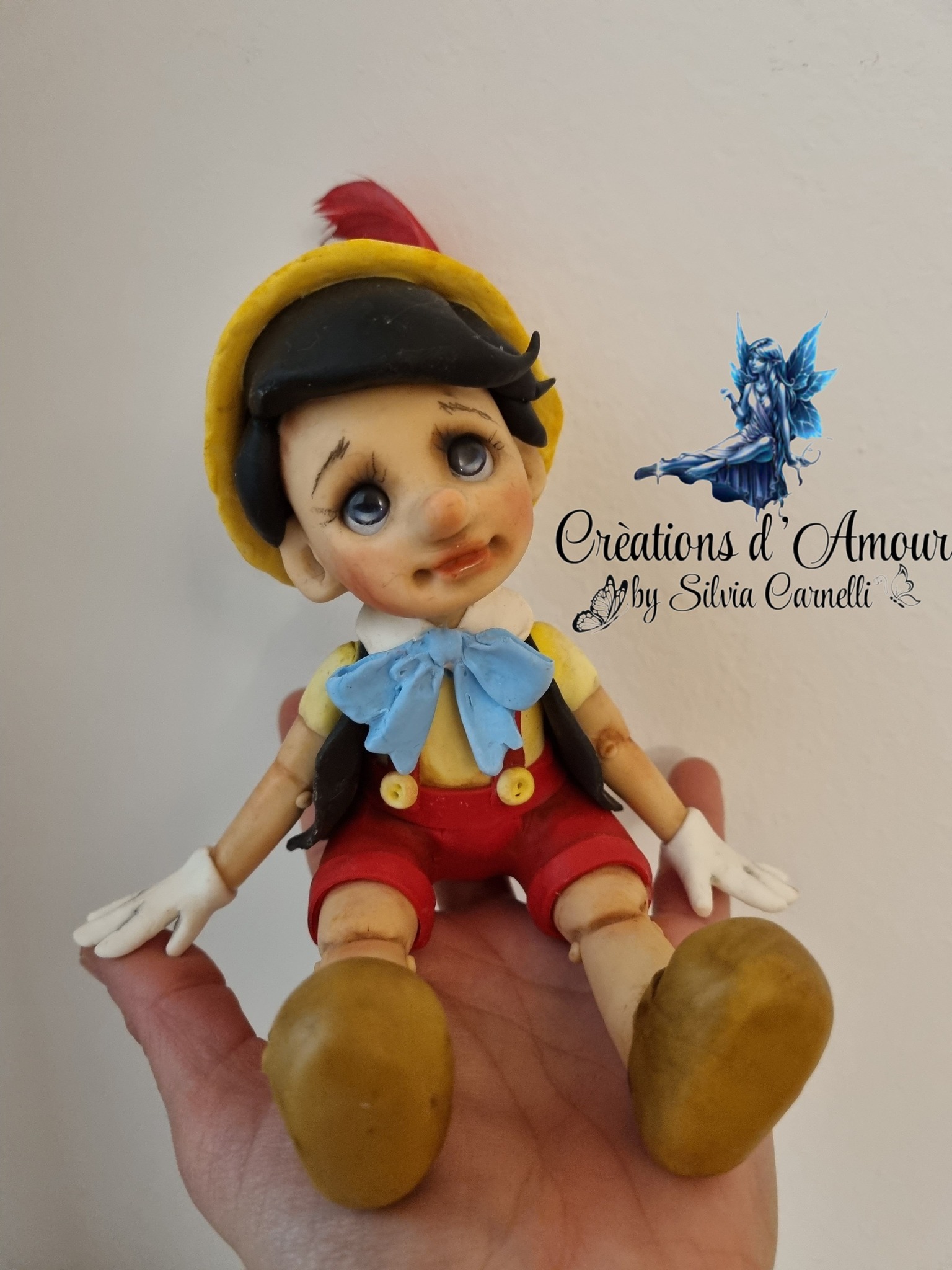 Handmade cold porcelain Pinocchio by Kammys Creations