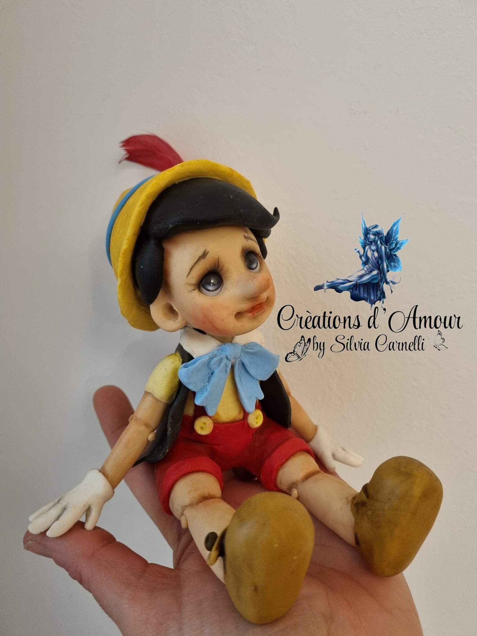 Handmade cold porcelain Pinocchio by Kammys Creations