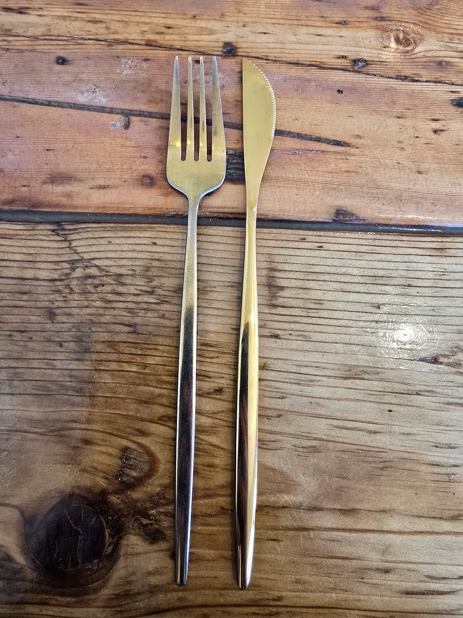 Does Anyone know exactly what Dillinger meant knife fork bottle 