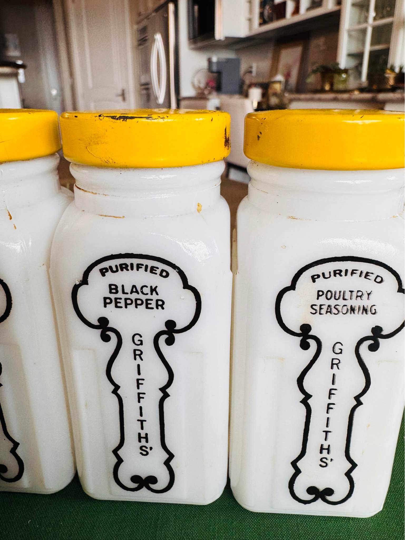 Great set of 4 vintage Griffith's Purified milk-glass spice jars