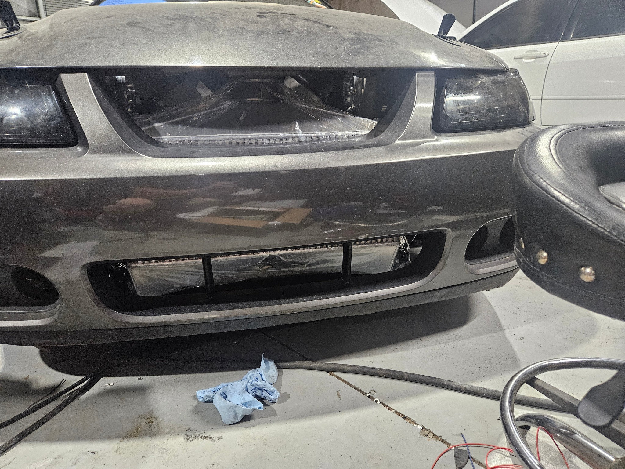 Front Nose Header Panel For 1999-2004 Ford Mustang - Unfinished Plastic, Direct Replacement 5 thumbnail image