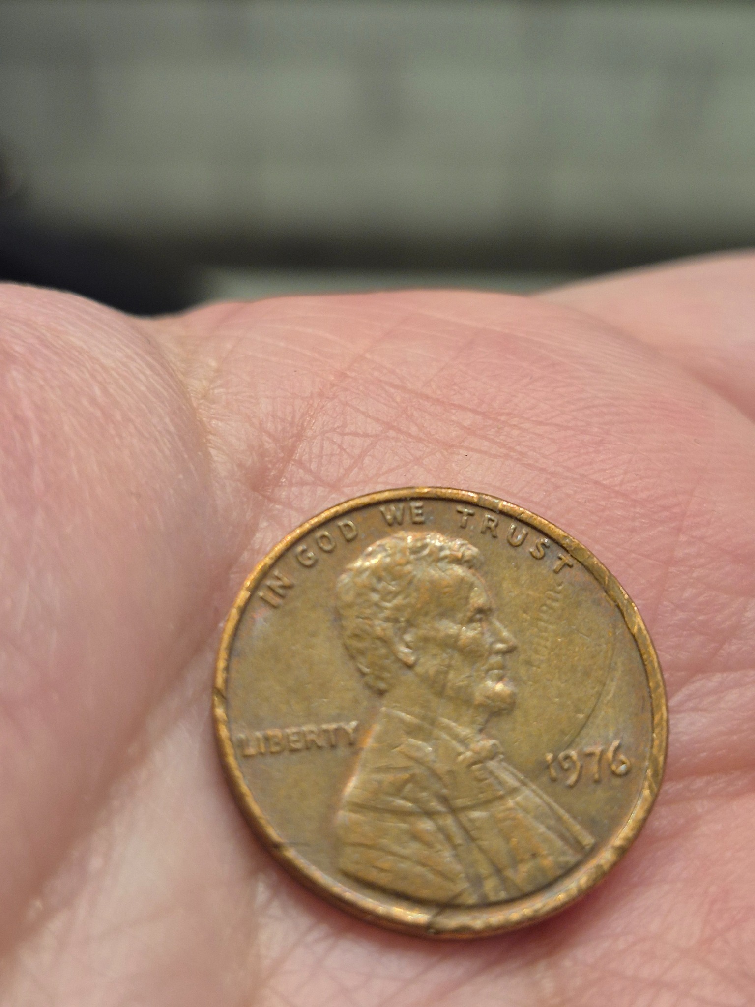 Is this penny with 'pluribus' lettering a real error coin?