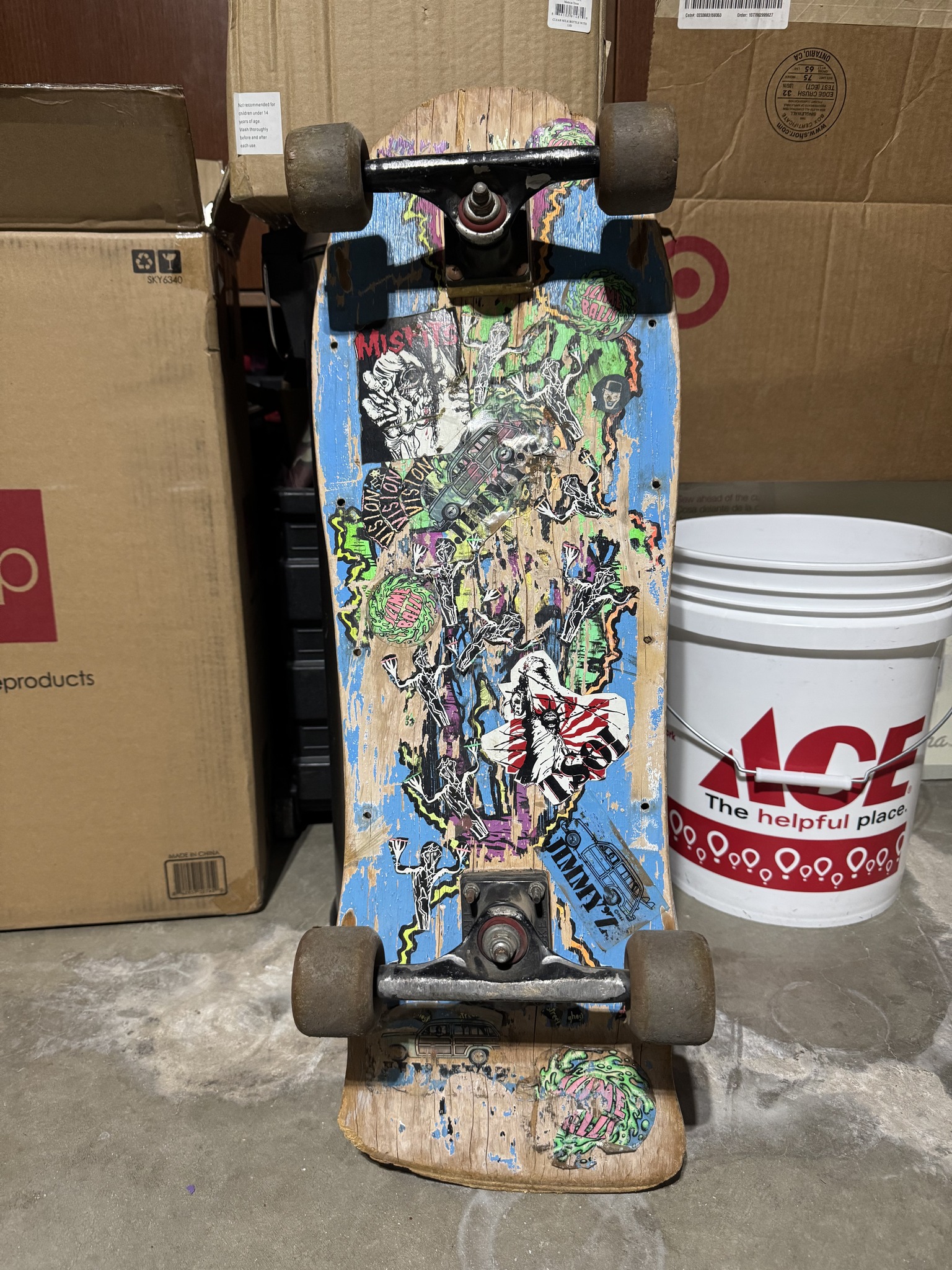 Vintage skateboards from the 80s, including Vision Street Ghost