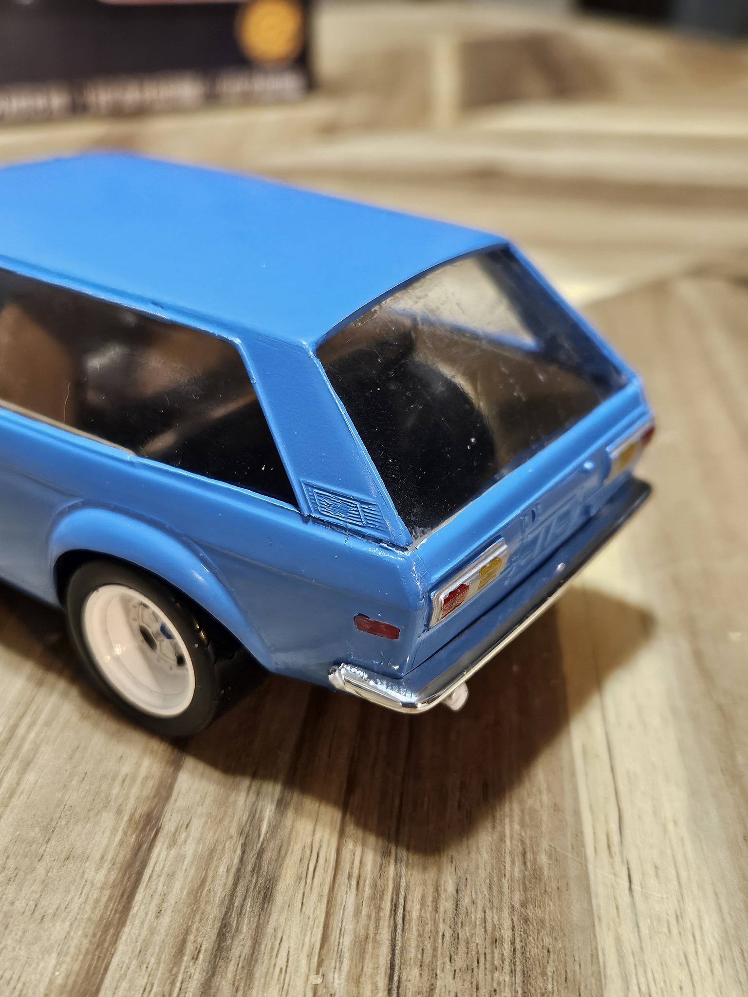 Datsun 510 wagon model with Pepsi bottle window mod