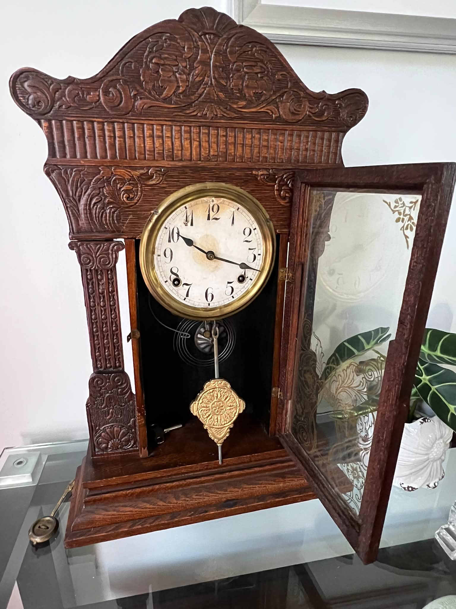 This clock is equipped with a No. 891 series, 8-day pendulum
