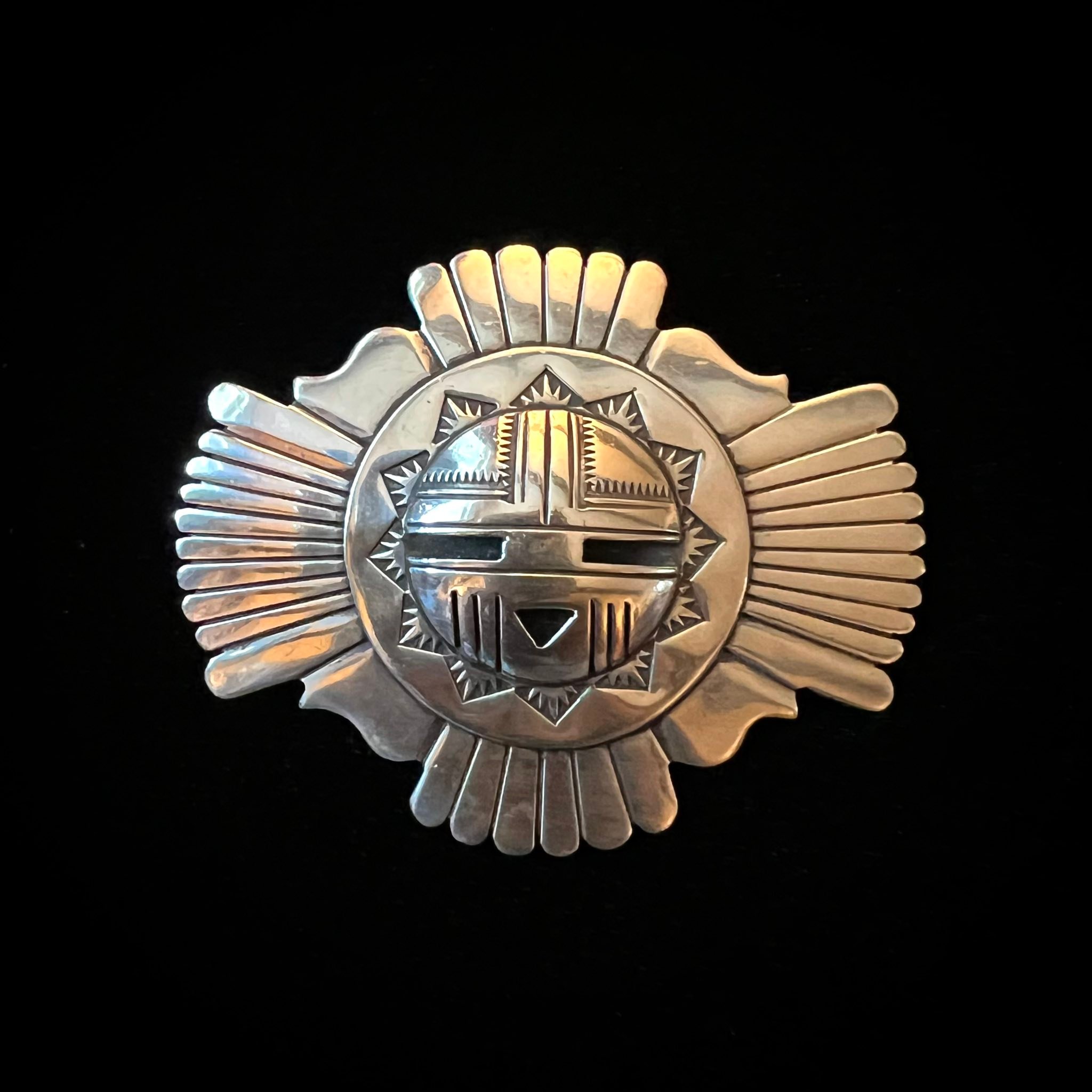 Eddie Chaco Navajo sterling silver sun face pin