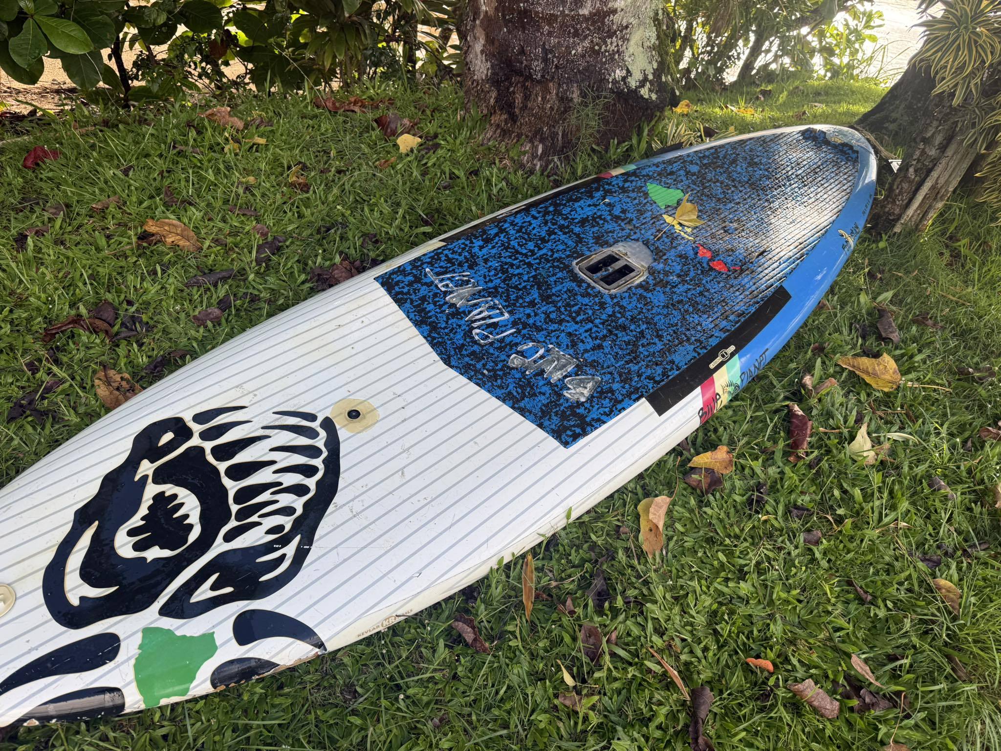 What beach was this surfboard left at on Kauai, HI?