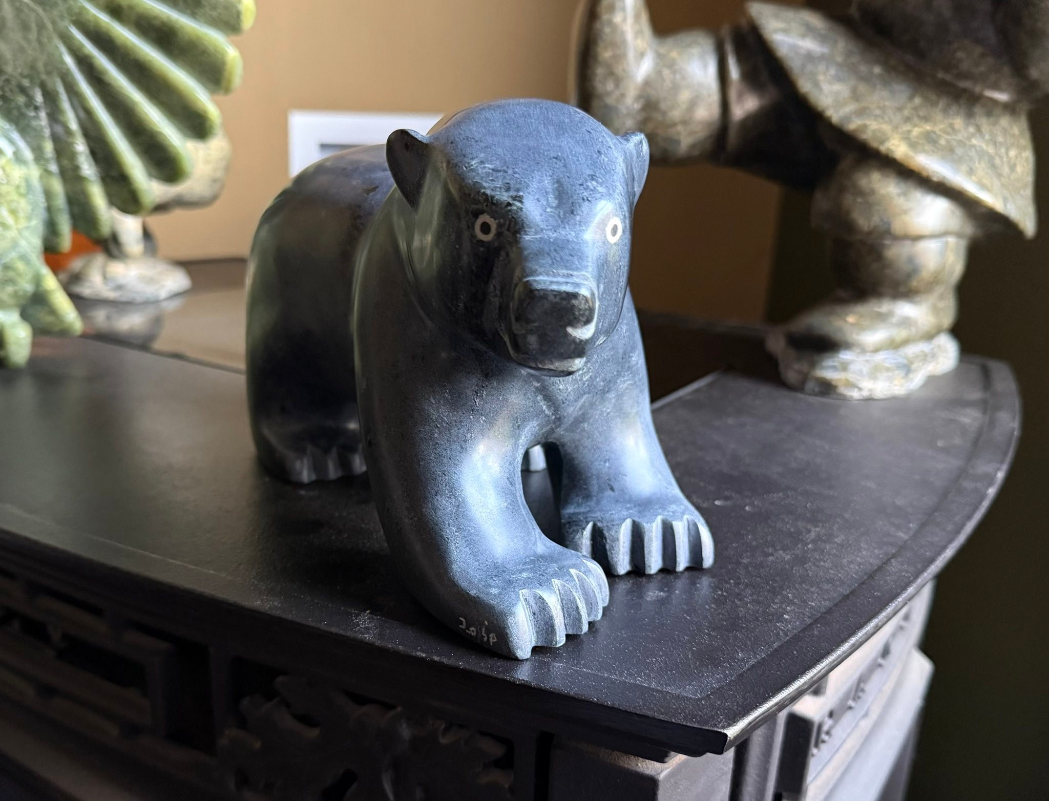 Inuit artist Thomas Ekoomiak's standing bear sculpture