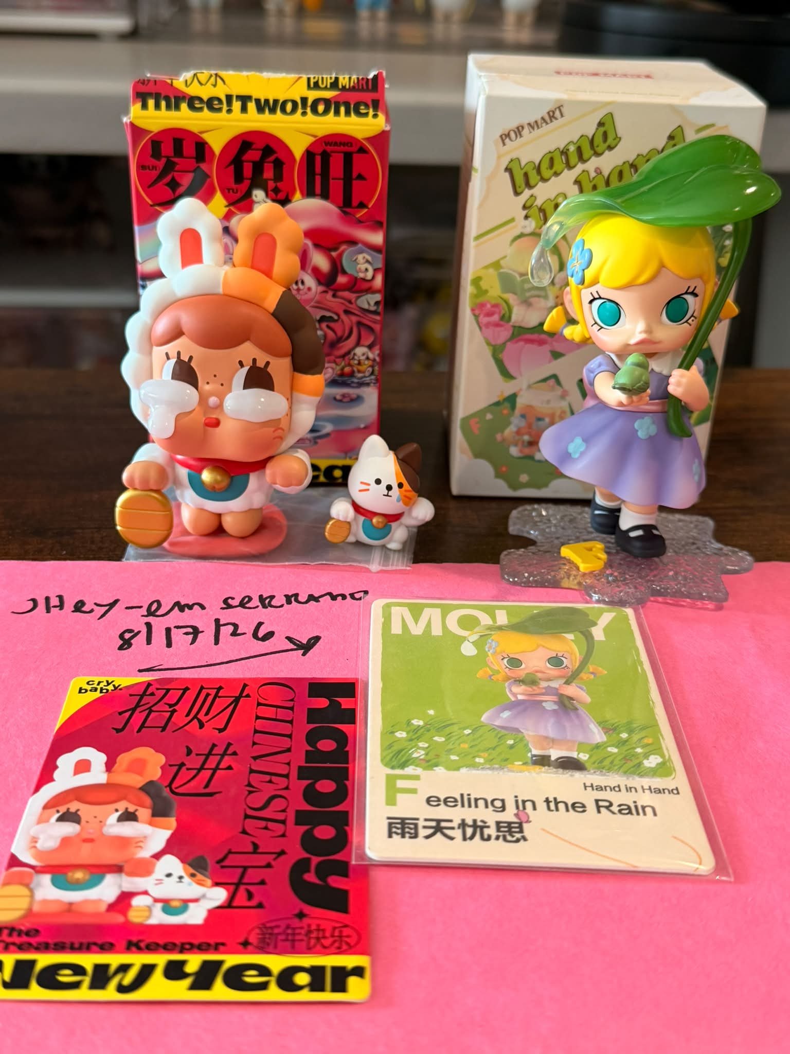 POP MART figurines and collectible cards for sale