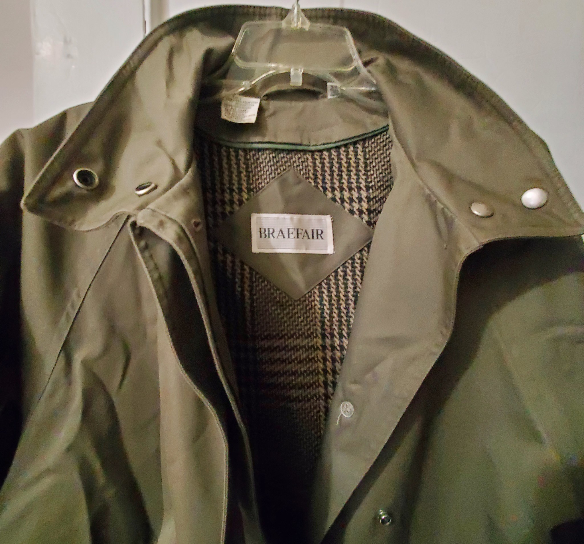 Great Overcoat in a grey/green color. With a removable faux lining 