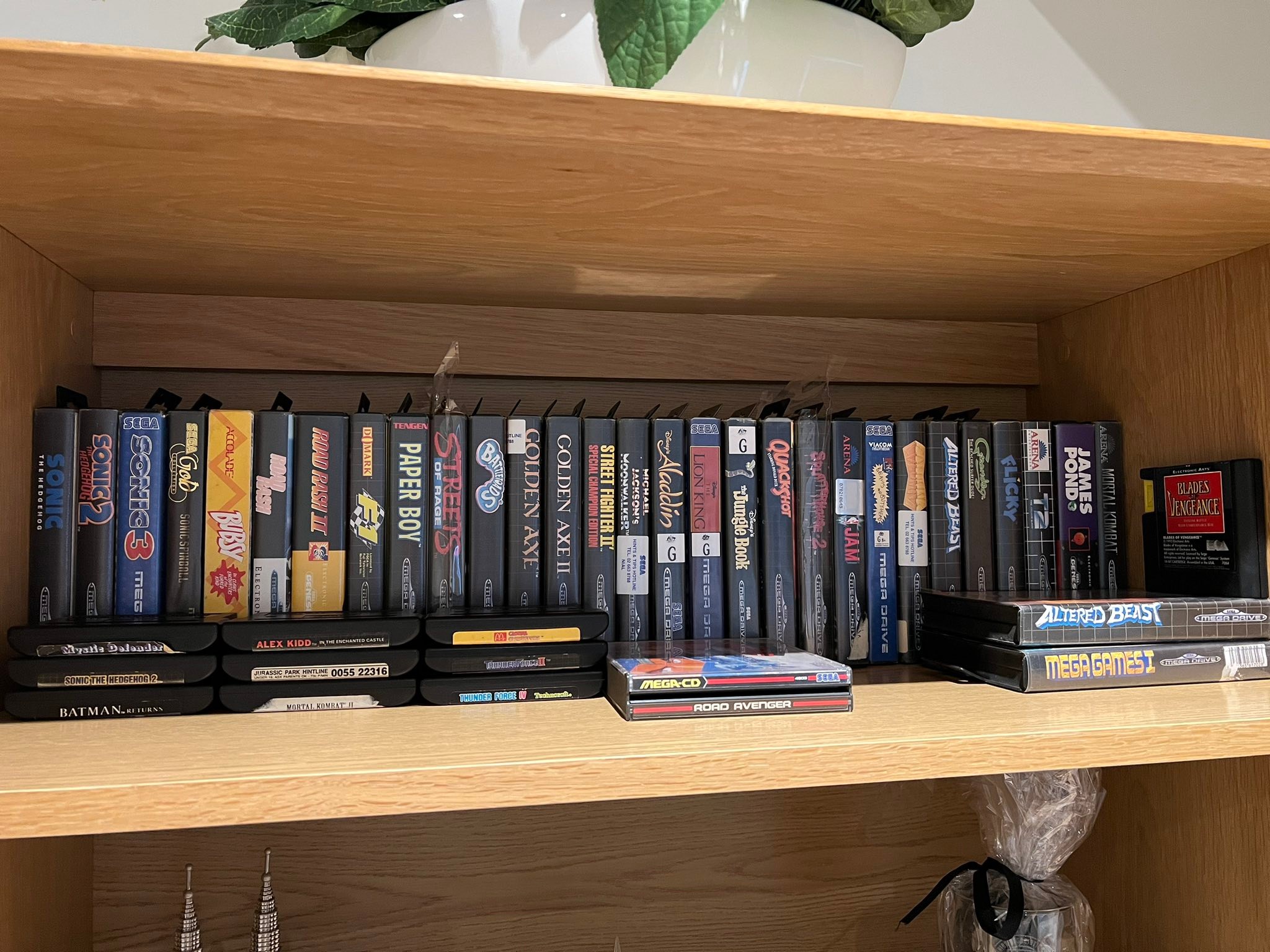 A shelf of used Sega Mega Drive games in Japan! Recognize any titles?