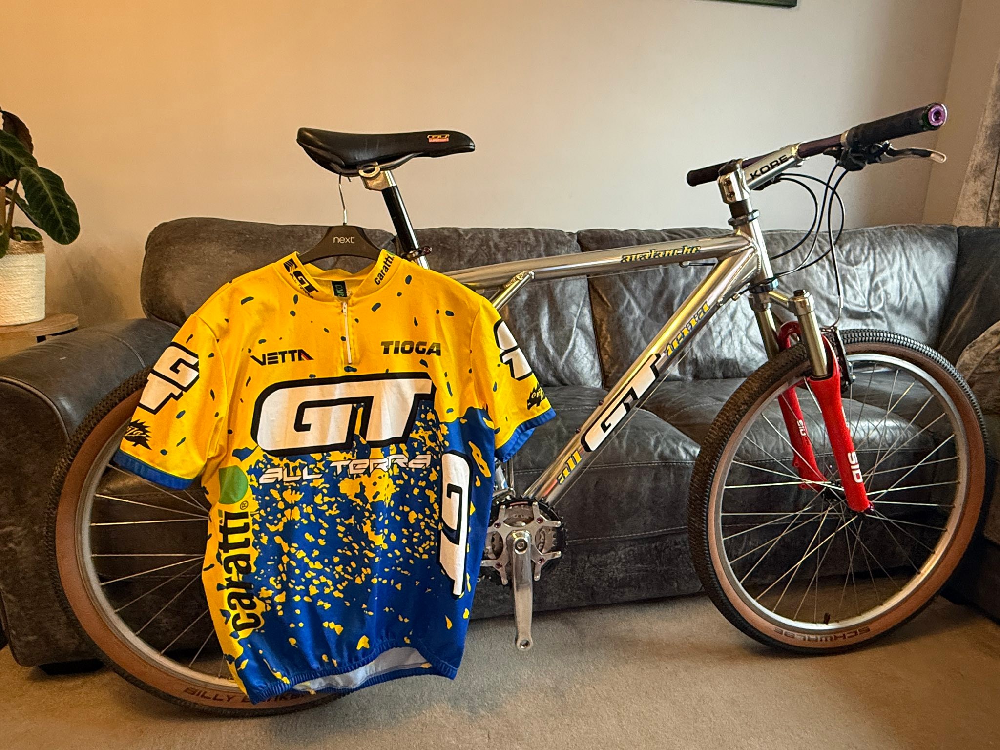 Restored GT bike with polished 7005 frame and RockShox SID XC fork