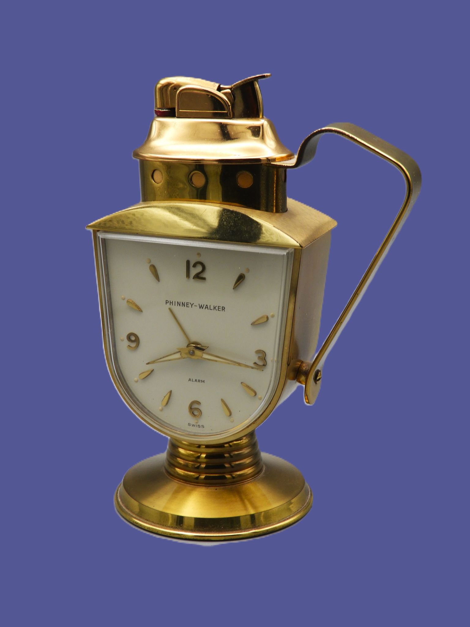A gorgeous Evans (USA) fuel table lighter with clock. Ca 1950's