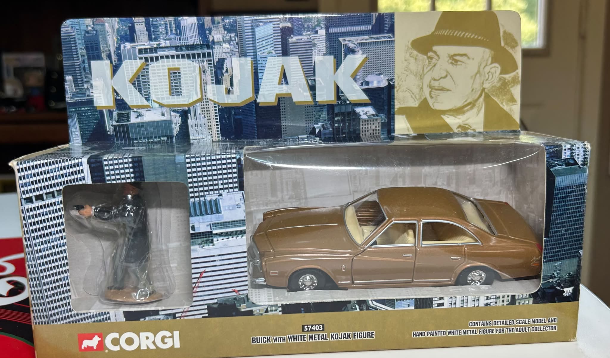Rare Corgi diecast brown Buick with Kojak figure