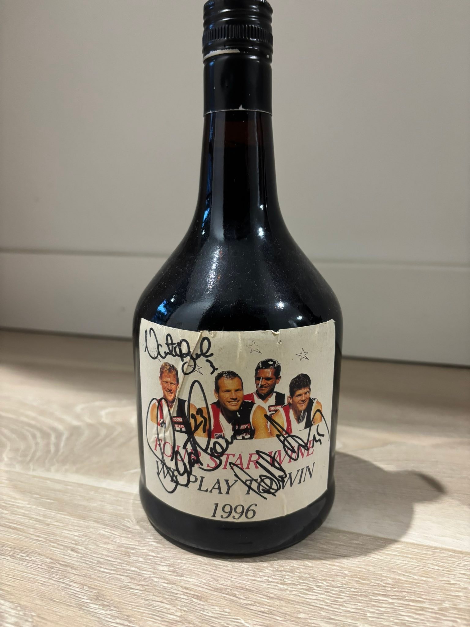 Signed wine bottles from 1996