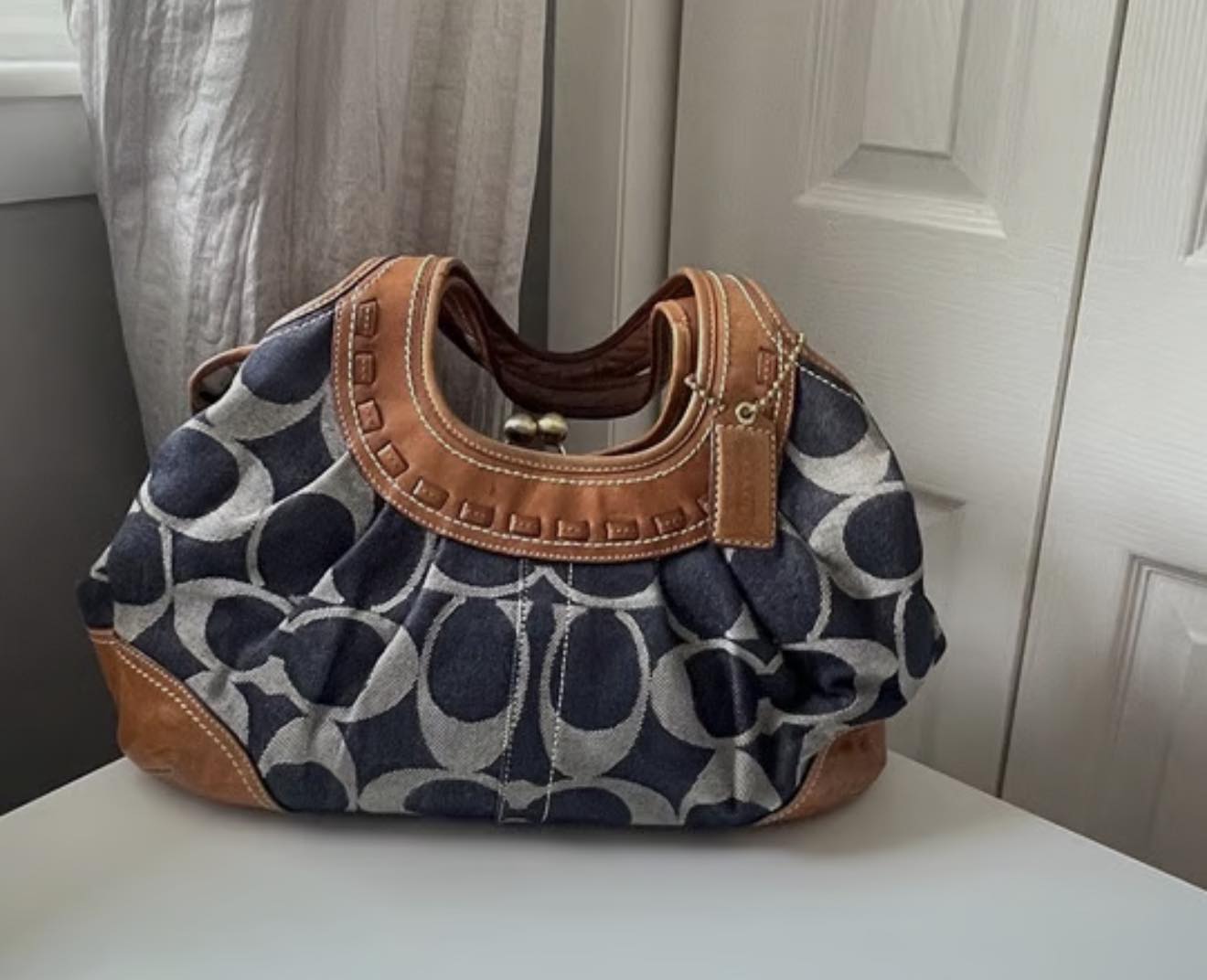 Did anyone get the Coach denim Kisslock Barrel Bag?