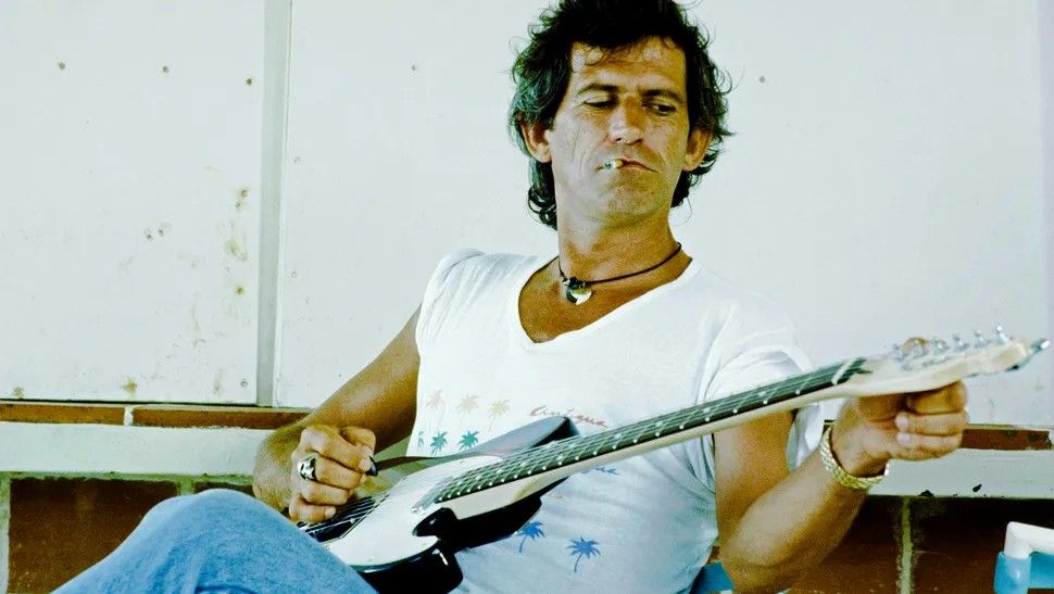 Keith Richards hangs out at a Tribeca dive bar back in 1988, right