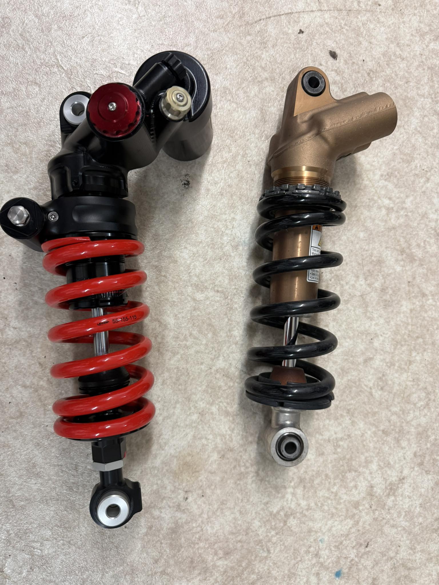 Will either KYB or Showa shock springs fit the Sachs shock on a 22