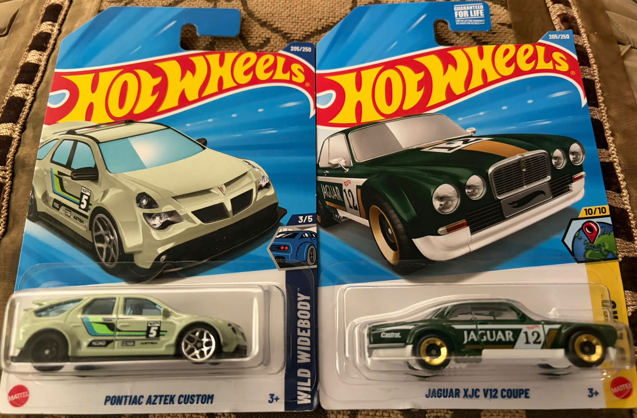 What car shares the 205/250 number with this Hot Wheels factory error?