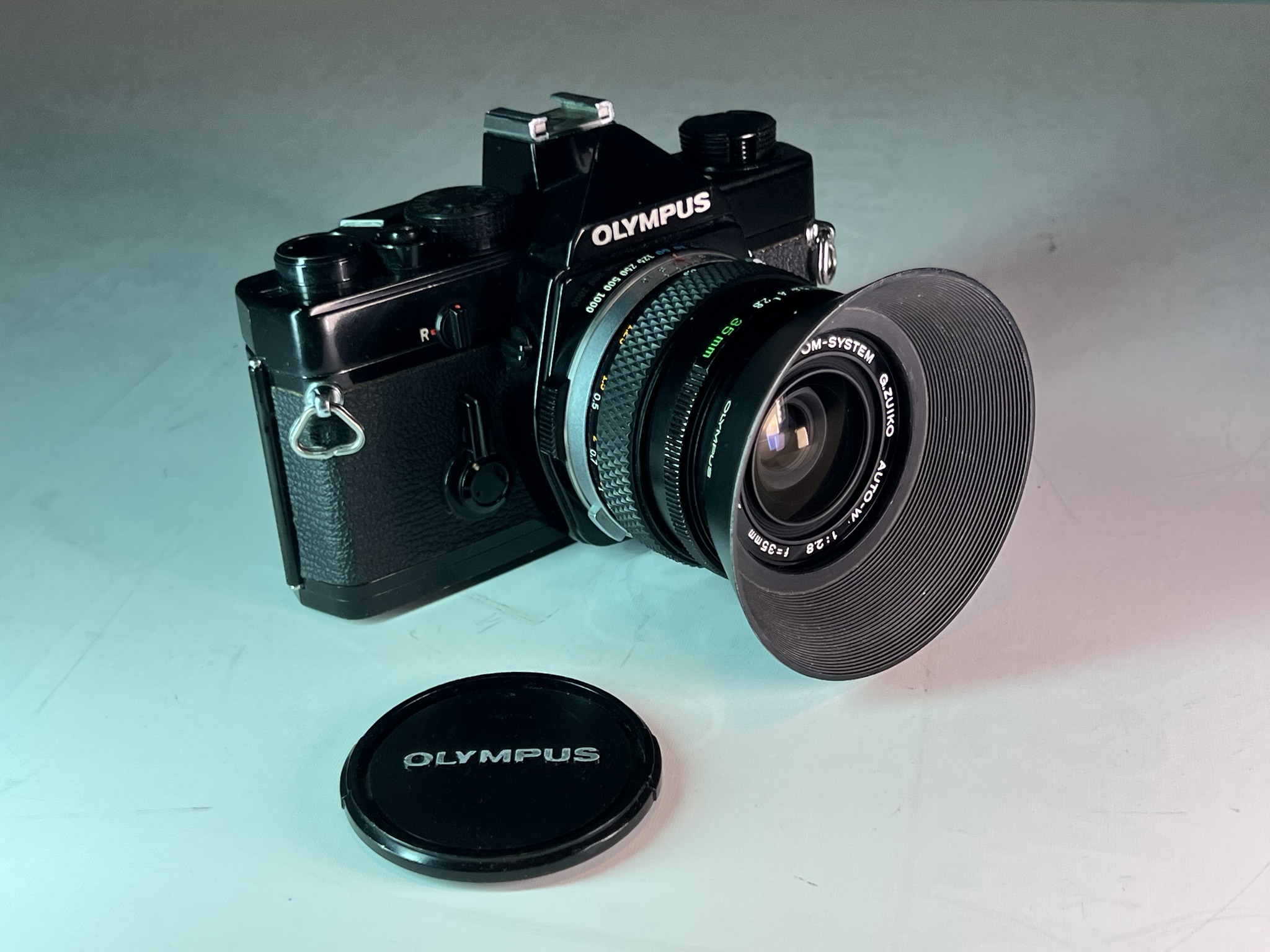 Found a like-new black Olympus OM-1 with 35mm f/2.8 lens for $75