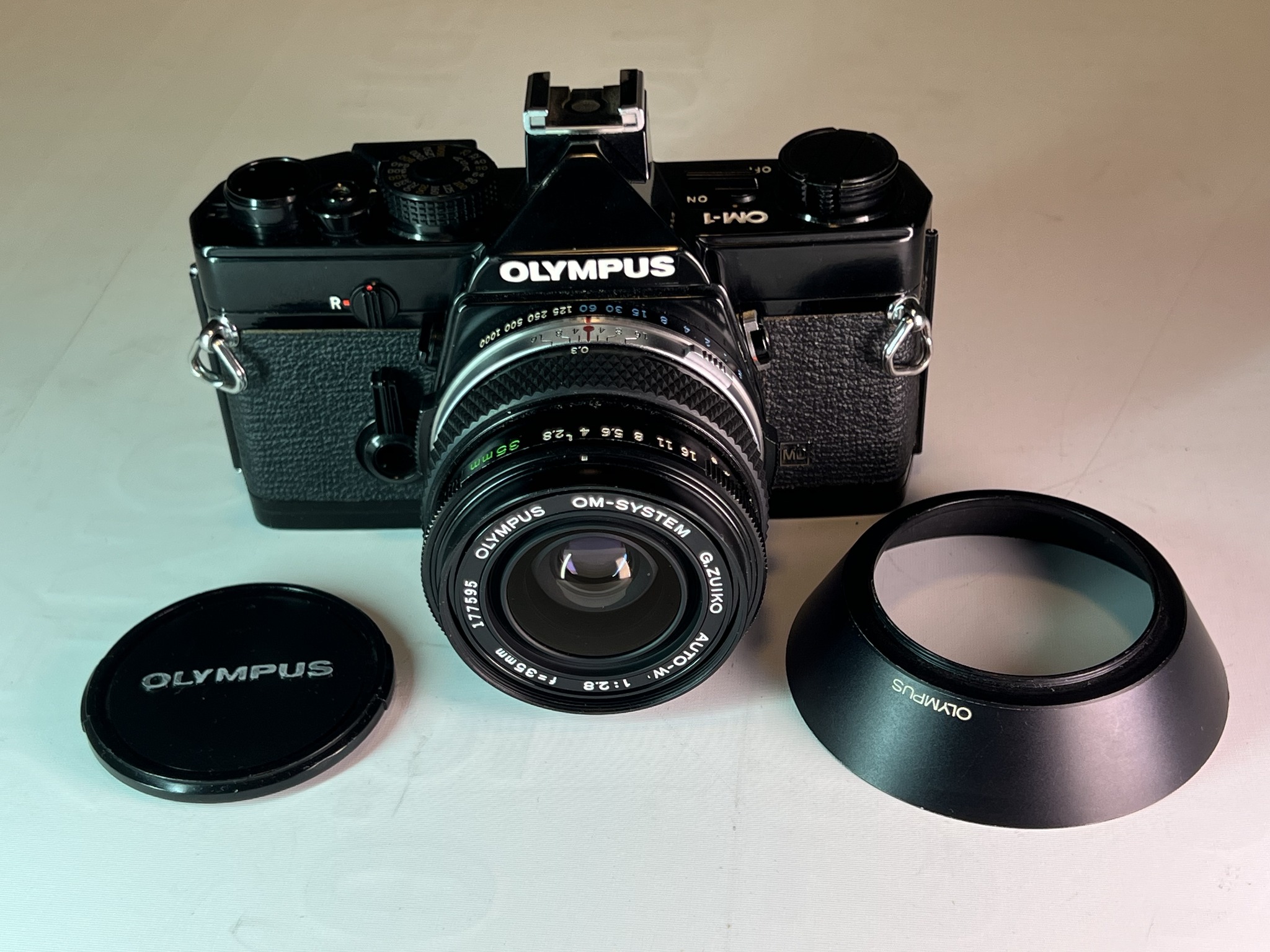 OLYMPUS OM-1 ブラック 35mm F2.8 85-250mm F5 Found a like-new black Olympus OM-1 with 35mm f/2.8 lens for $75