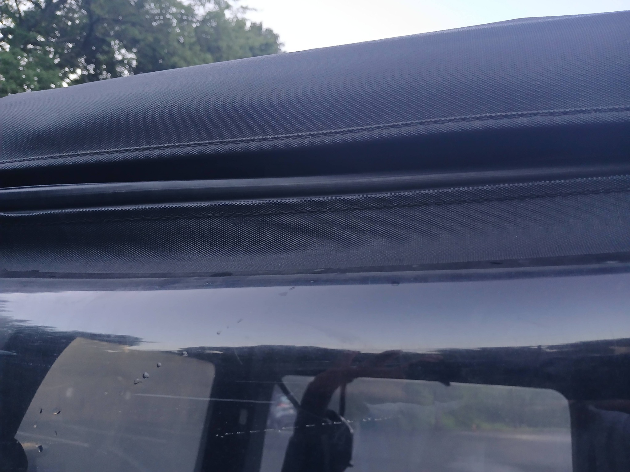 Got a 2021 sport soft top. The passenger side window keeps coming