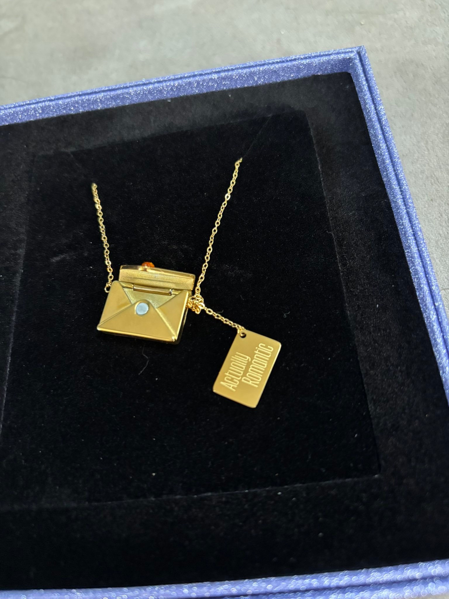 Taylor Swift's deluxe CD set necklace is a romantic locket