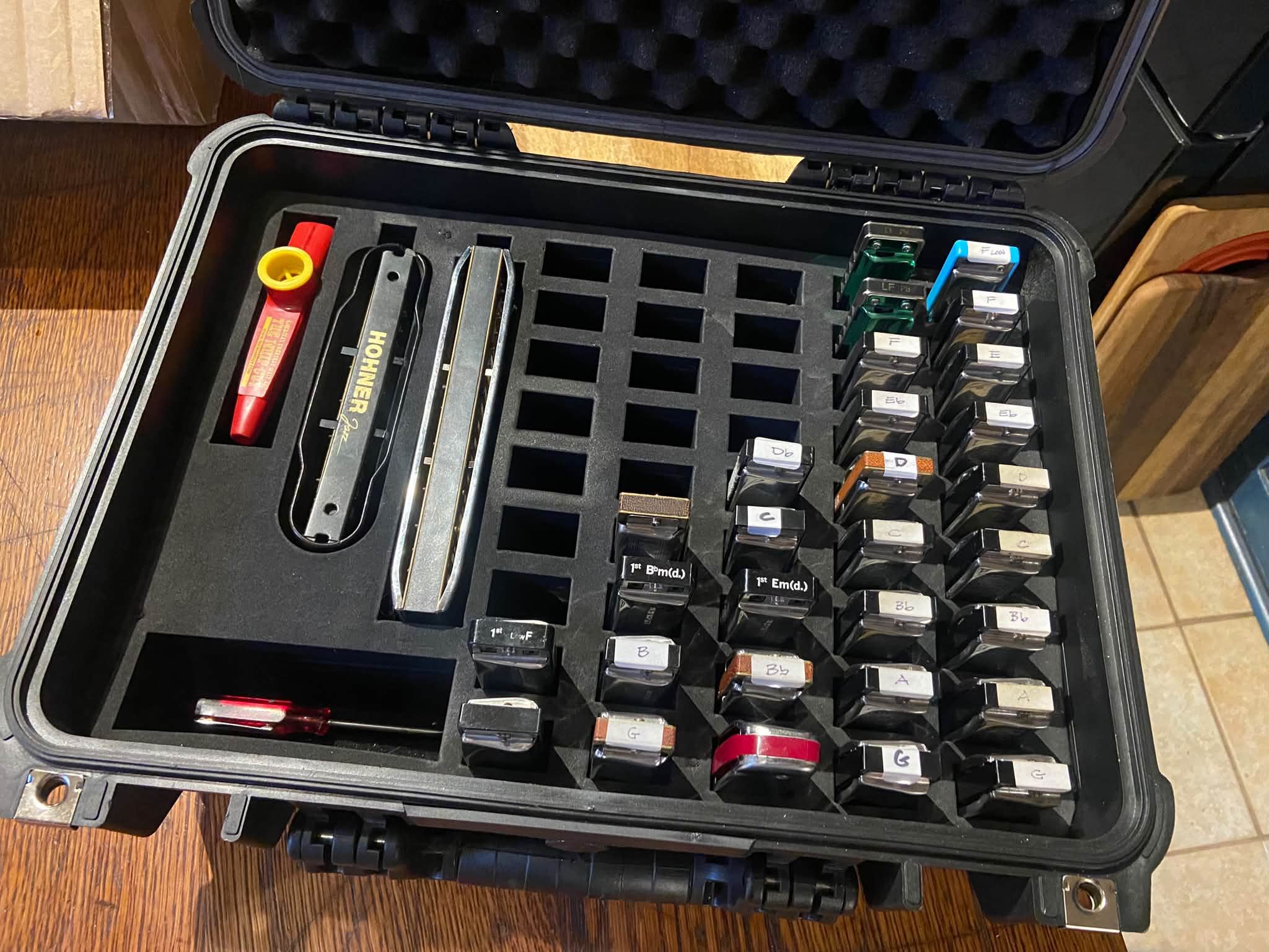 Custom laser-cut inserts for Apache harmonica case from Harbor Freight