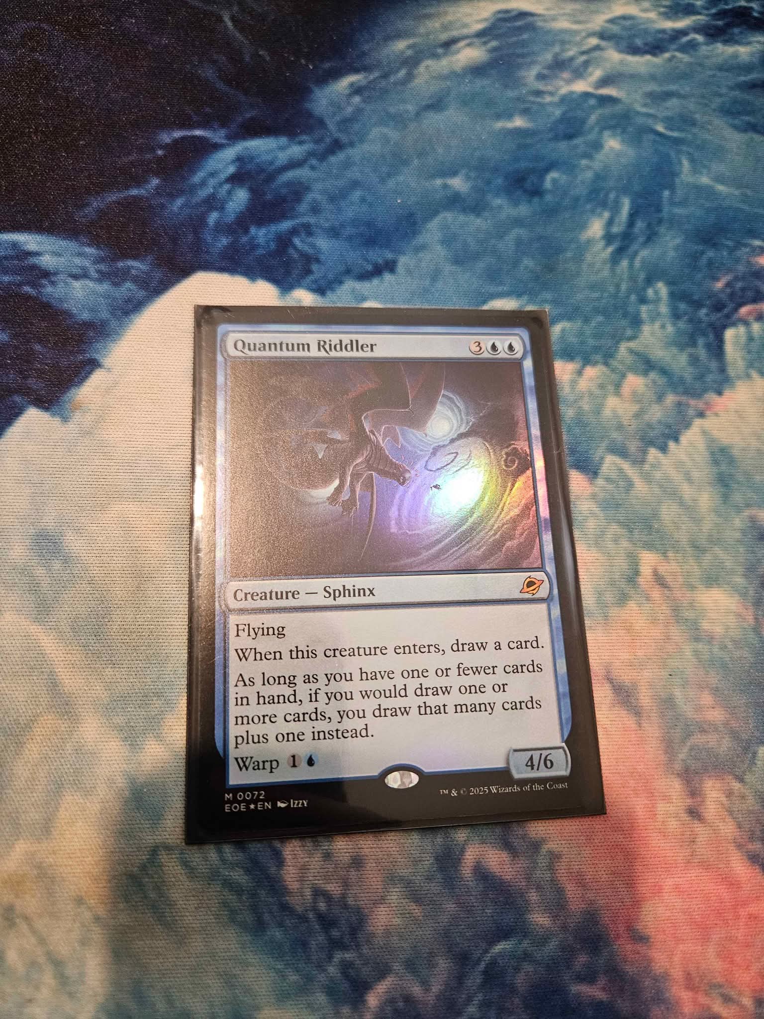 Looking to trade (or sell) my foil Quantum Riddler (#72) for 