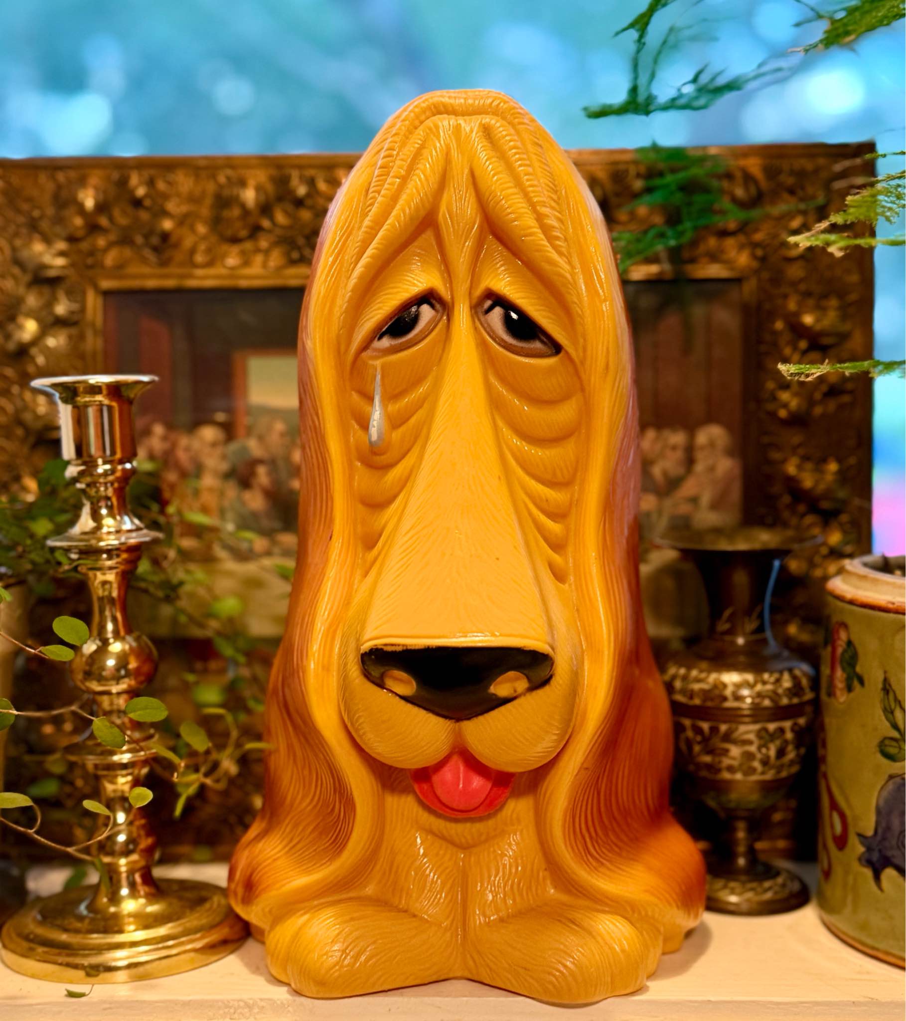 Vintage sad eyes plastic basset hound coin bank featuring droopy