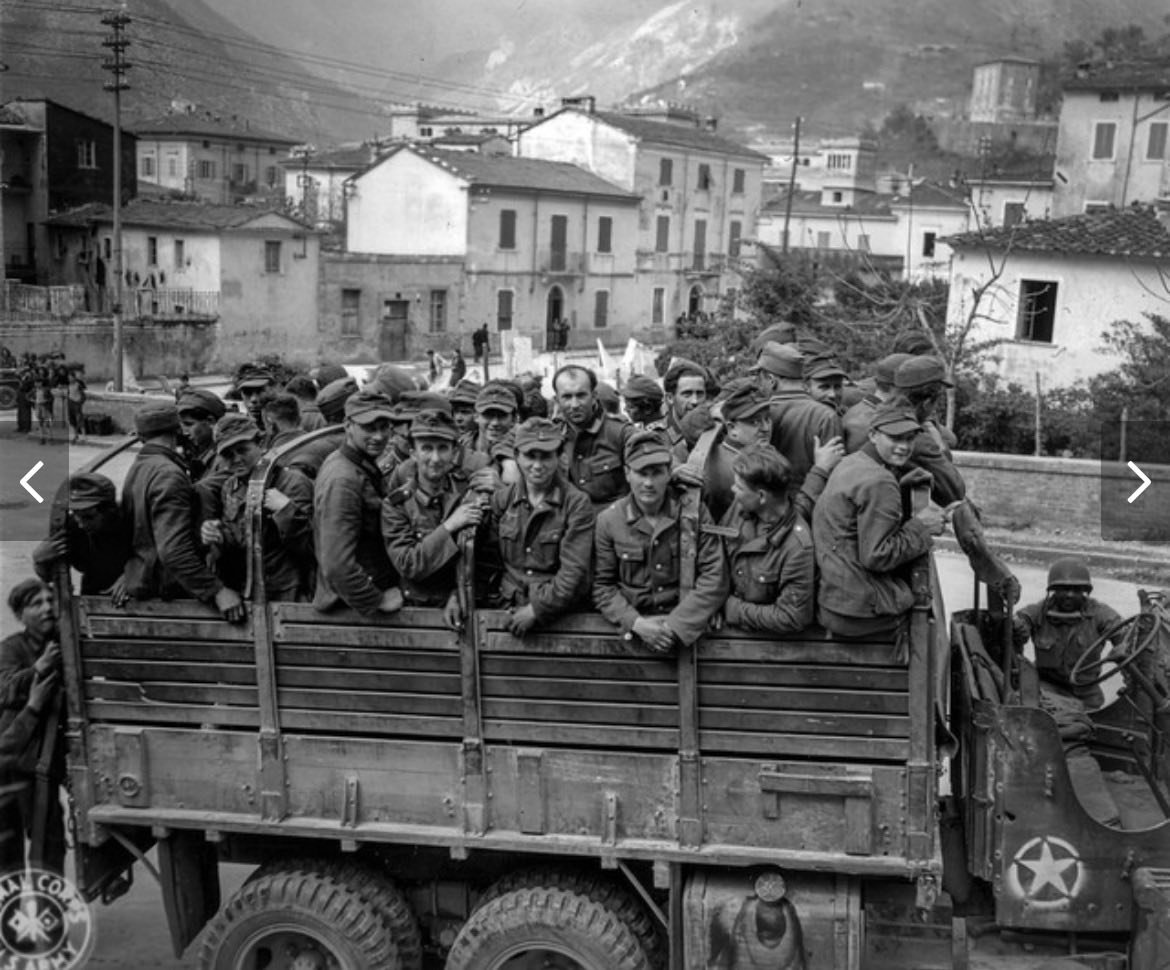 US Army soldier Sam Yoshihana photographed leading a row of German
