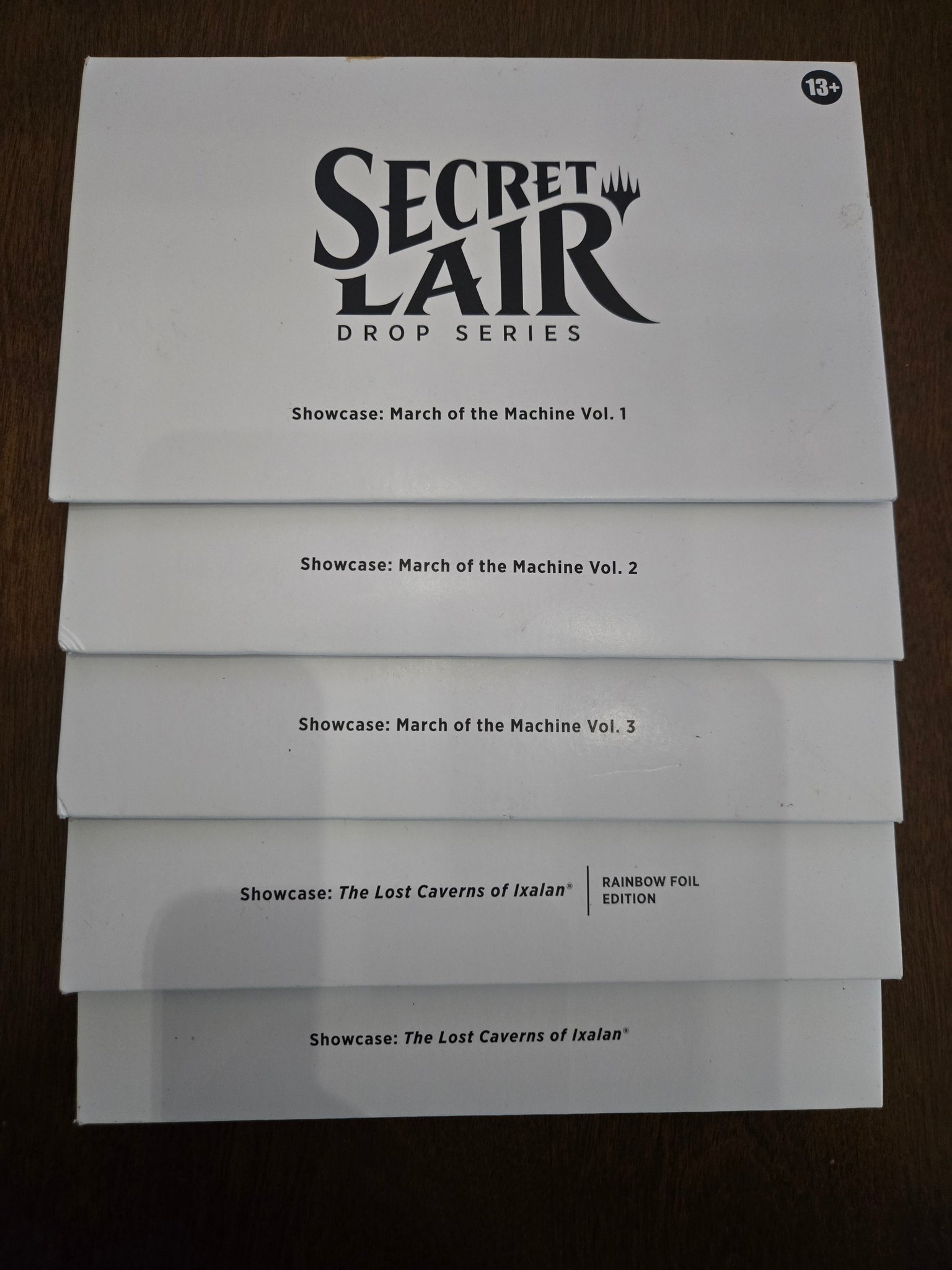 Should I keep secret lairs sealed or open them?