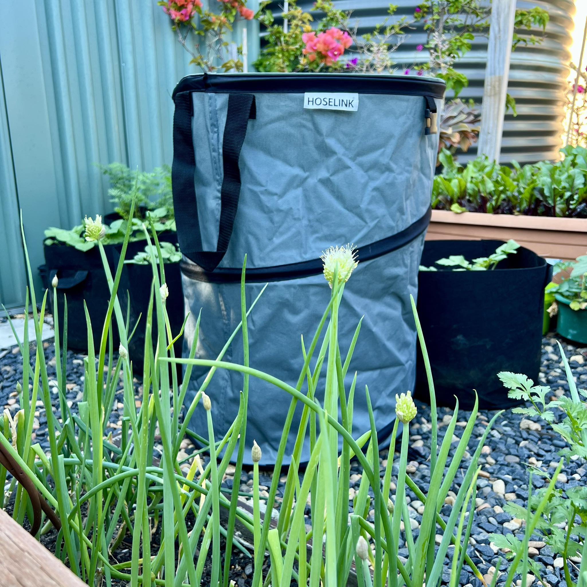 Gardenline 26Gal pop-up garden bag as outside trash can
