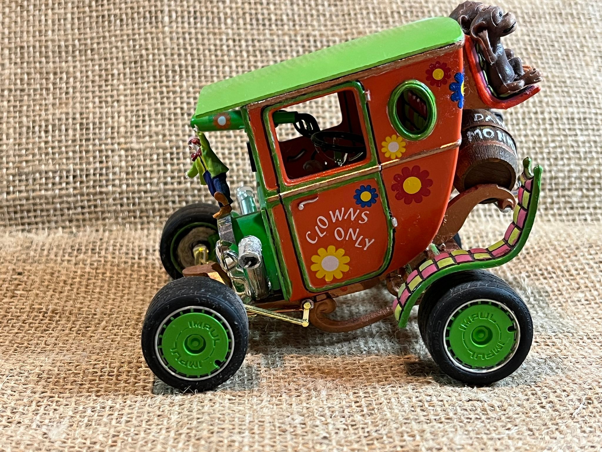 Custom-built clown car with circus wagon companion