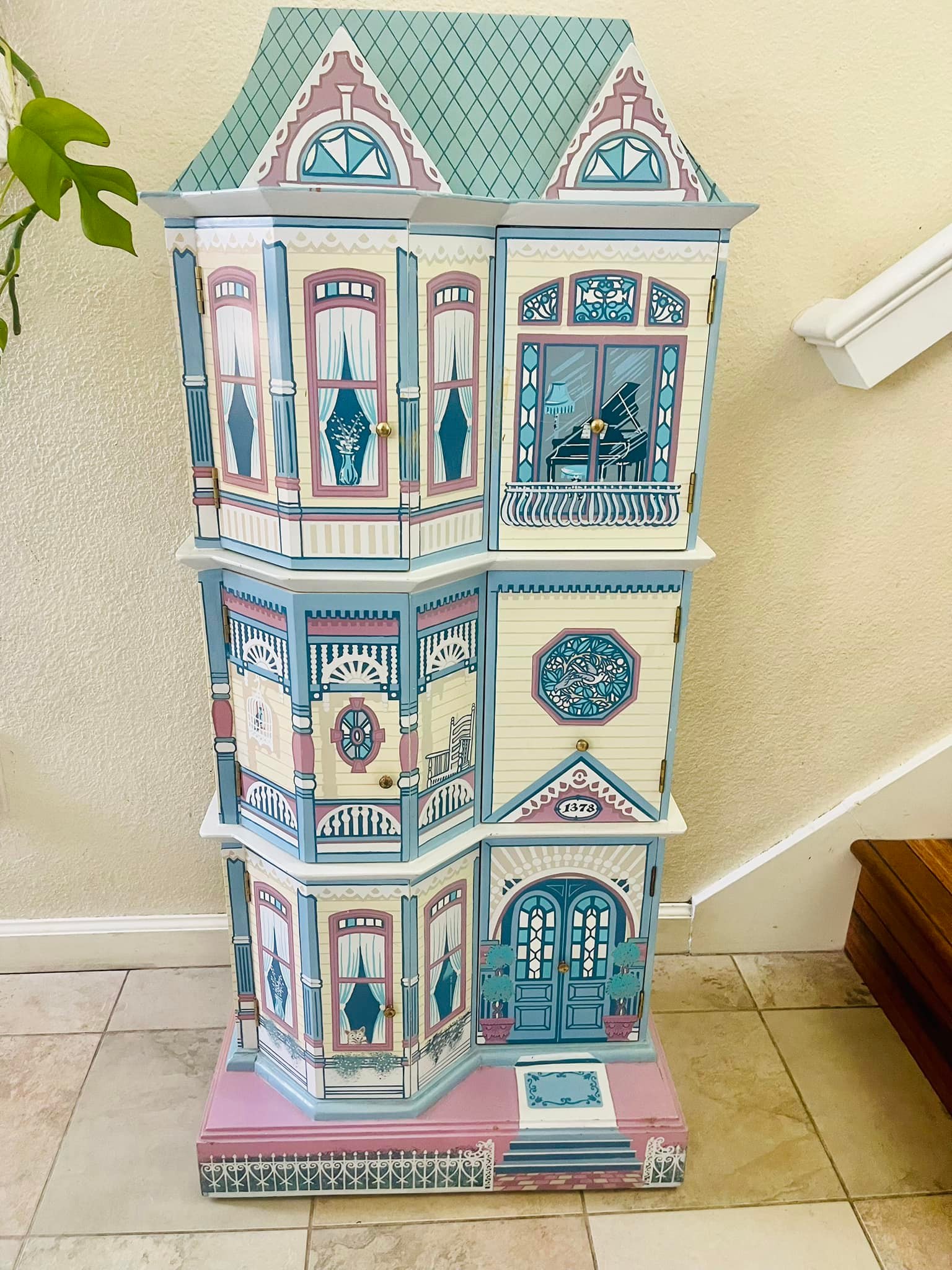 Free hand painted wooden dollhouse near downtown Santa Cruz