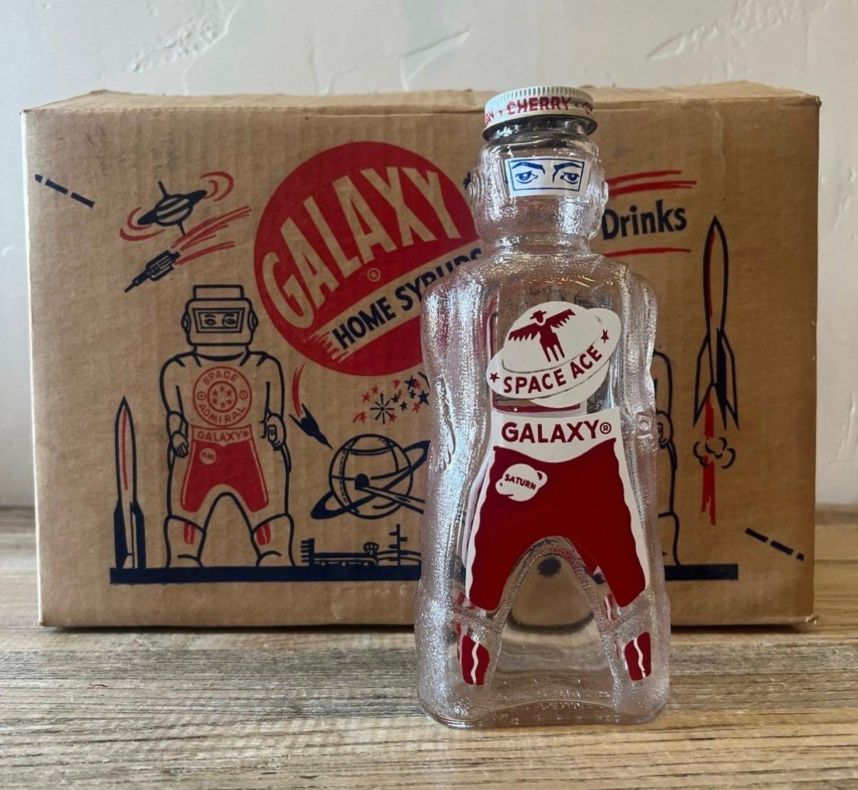 Vintage 1953 Galaxy Spaceman soda syrup bottles