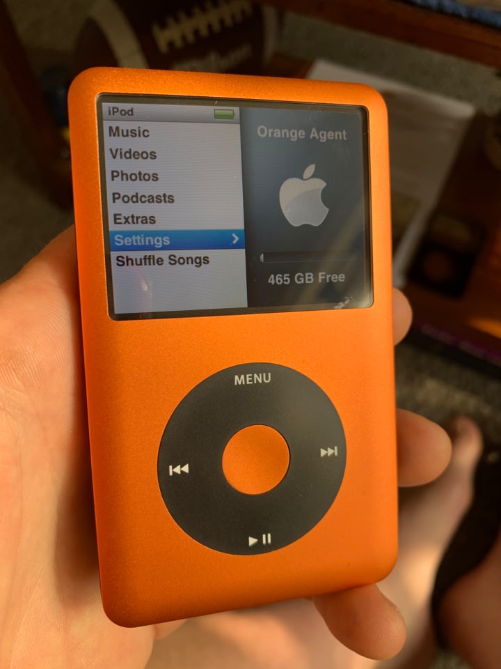 Customized orange iPod Classic with larger battery