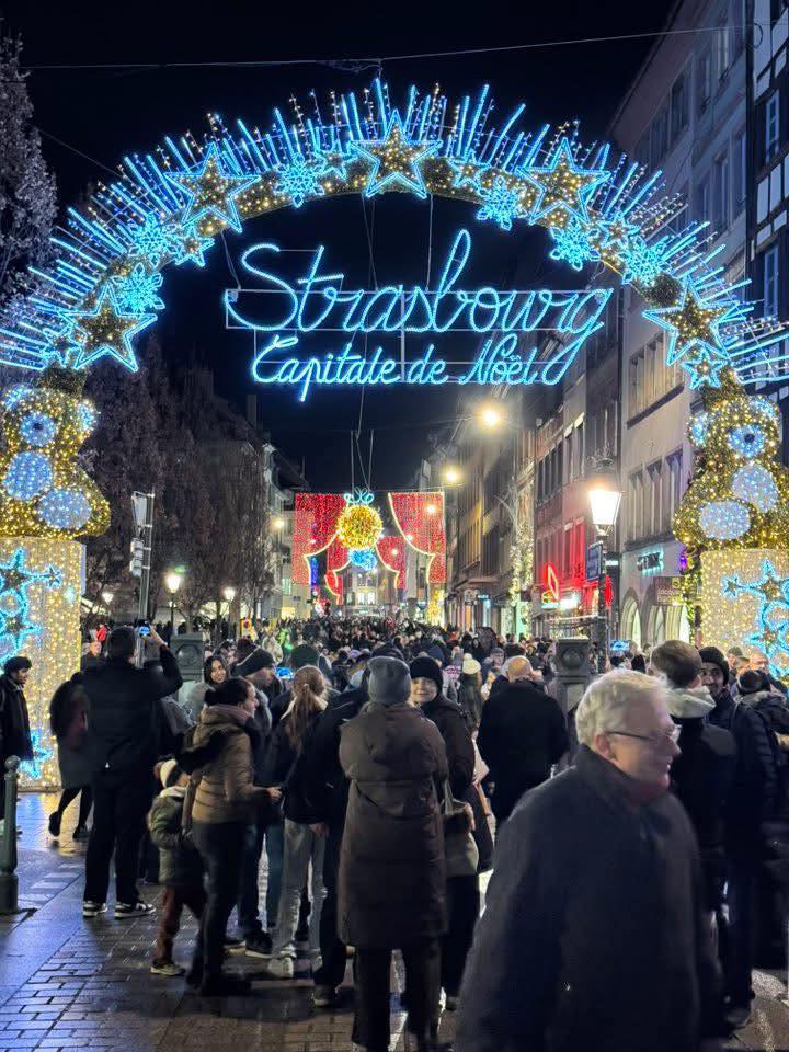Which Strasbourg market has the Christmas sign in the photo?