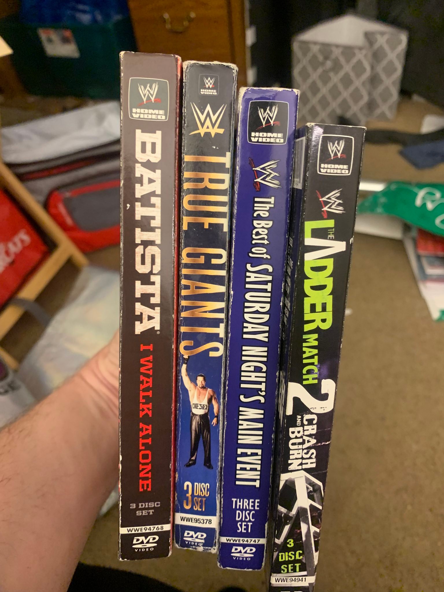 WWE DVD collection with new additions from Half Price Books
