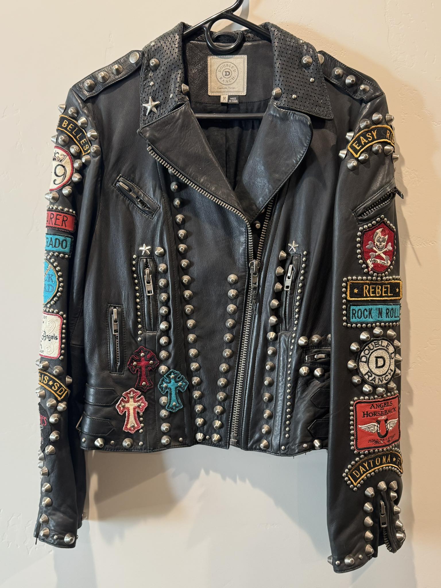The legendary diamond snaps, iconic of Rockmount Ranch Wear and 