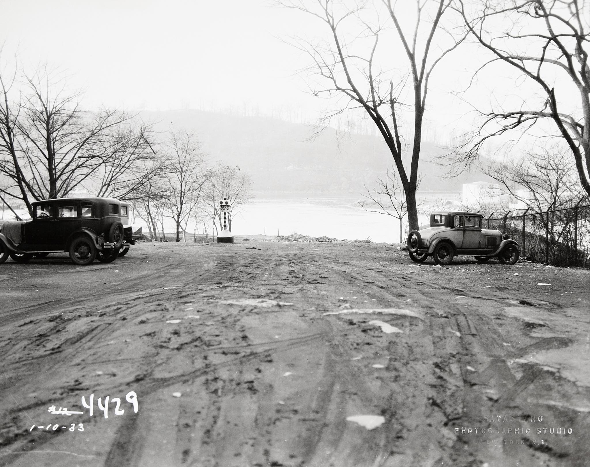 Vintage cars by Spuyten Duyvil Creek in 1933