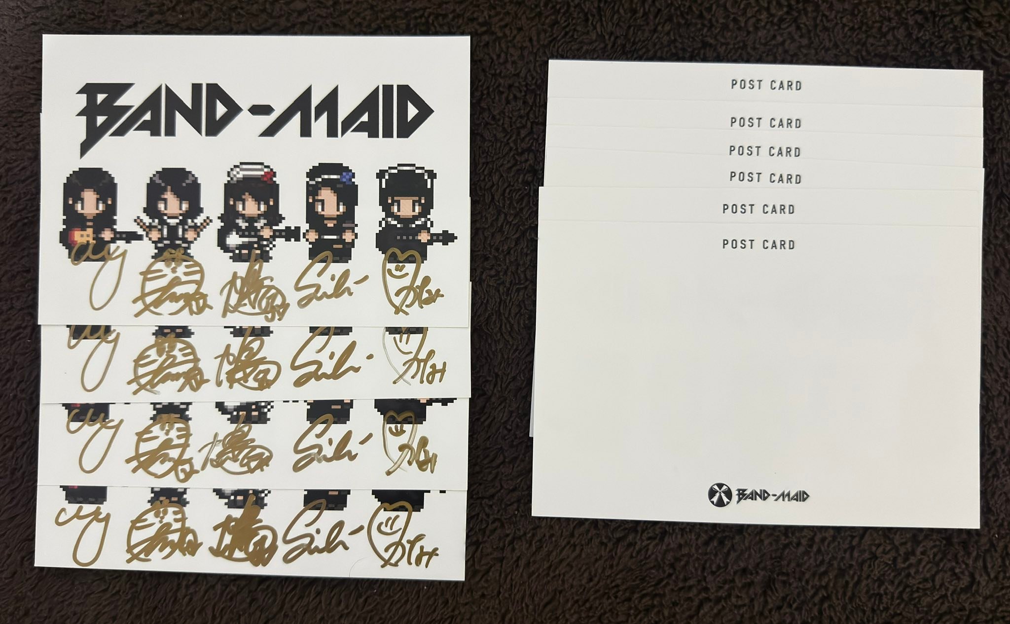 Are Band-Maid postcard autographs real?